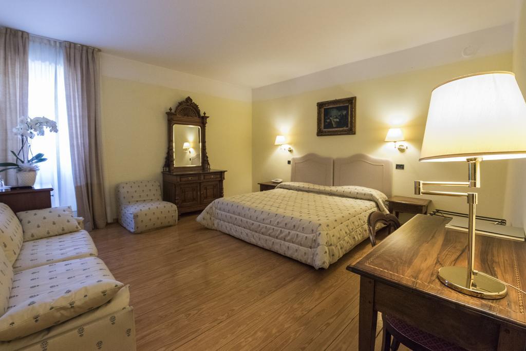 Locanda La Posta Cavour Bagian luar foto
